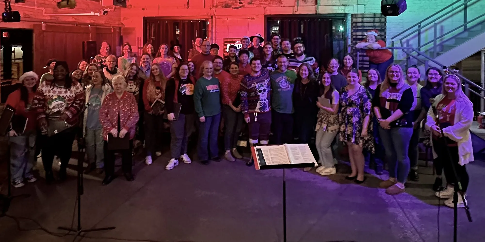 The choir gathered together in festive jumpers at their Christmas concert.